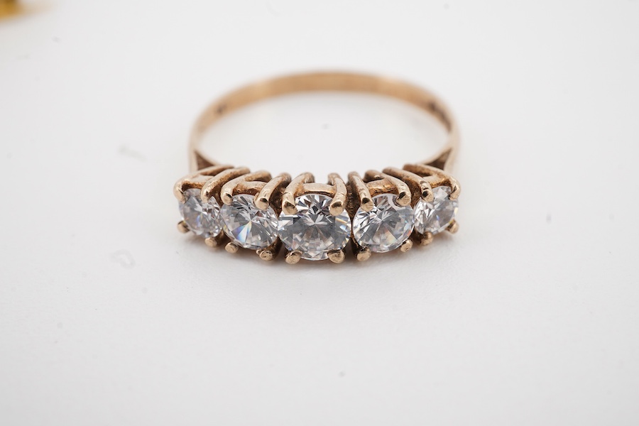 A 1960's Garrard & Co 9ct gold and two colour enamel sweethearts brooch, 36mm, with Asprey box, together with a 9ct gold and five stone simulated diamond set half hoop ring.